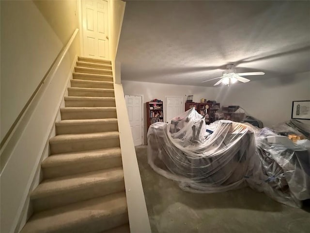 interior space with a ceiling fan