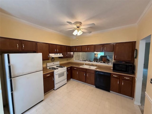 kitchen featuring dark brown cabinetry, ceiling fan, a sink, under cabinet range hood, and black appliances