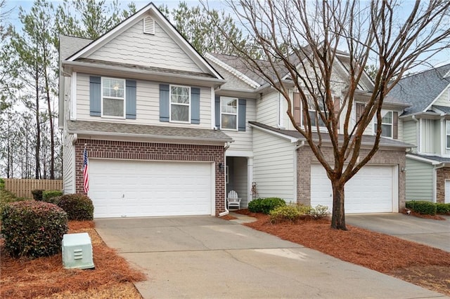 view of front of property with a garage