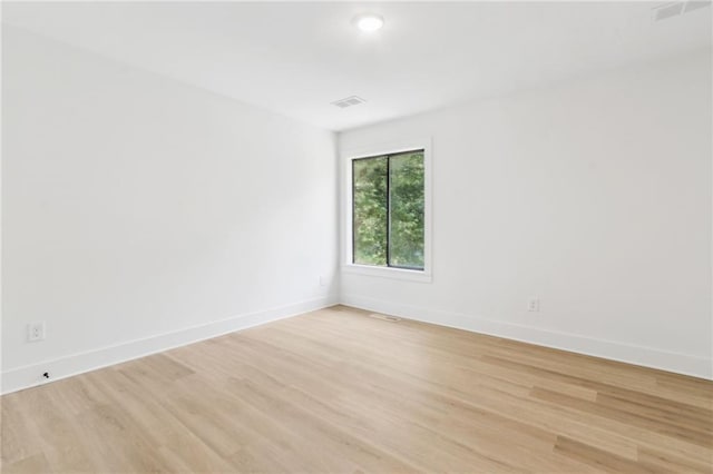 2010 Barnes Mill Rd, Marietta, GA 30062 - empty room featuring light wood-type flooring and recessed lighting