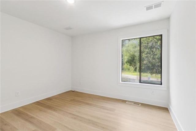 2010 Barnes Mill Rd, Marietta, GA 30062 - unfurnished room featuring light wood-style floors and baseboards