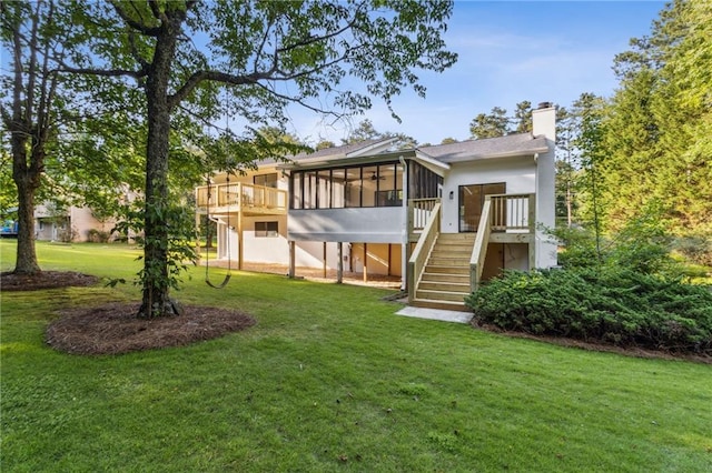 2010 Barnes Mill Rd, Marietta, GA 30062 - back of property with a sunroom, stairway, a yard, a wooden deck, and a chimney