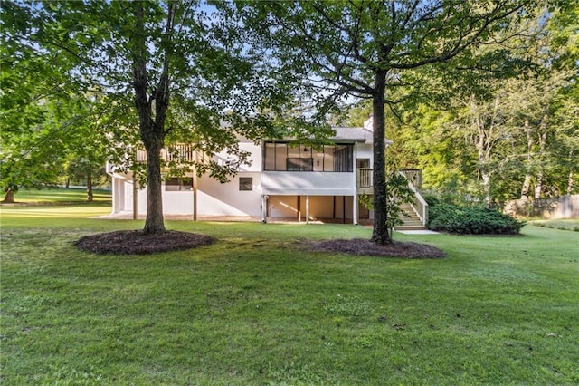 2010 Barnes Mill Rd, Marietta, GA 30062 - view of green lawn with stairway and a sunroom