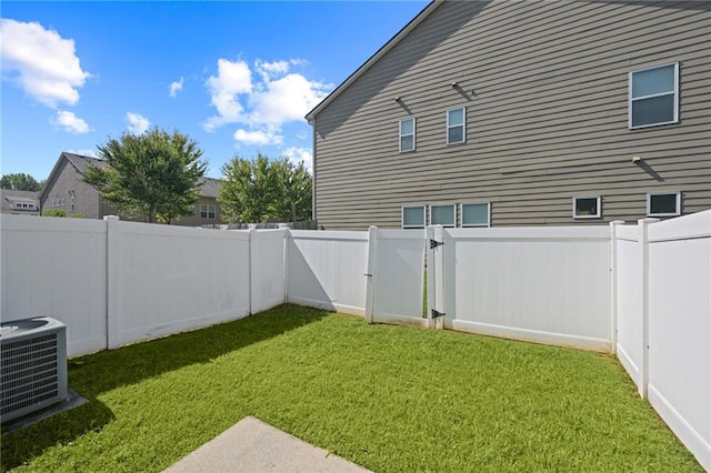 view of yard featuring central AC unit