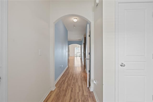 hallway with light wood-type flooring