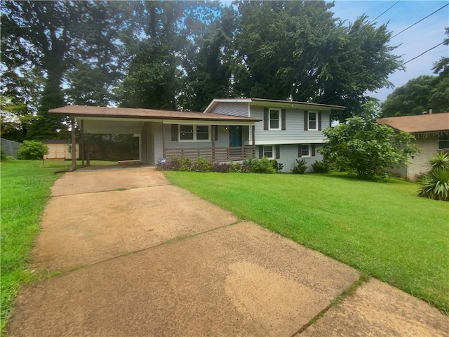 split level home featuring a front lawn and a carport