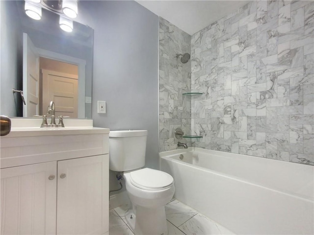 full bathroom featuring vanity, toilet, and tiled shower / bath combo