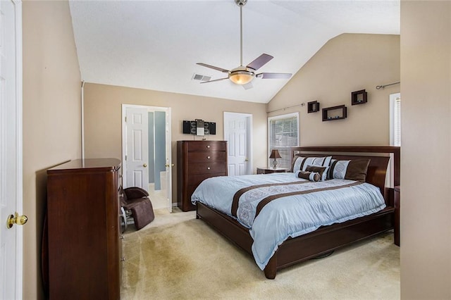 7057 Silver Bend Ovrlk, Austell, GA 30168 - bedroom featuring lofted ceiling, light carpet, ceiling fan, and connected bathroom