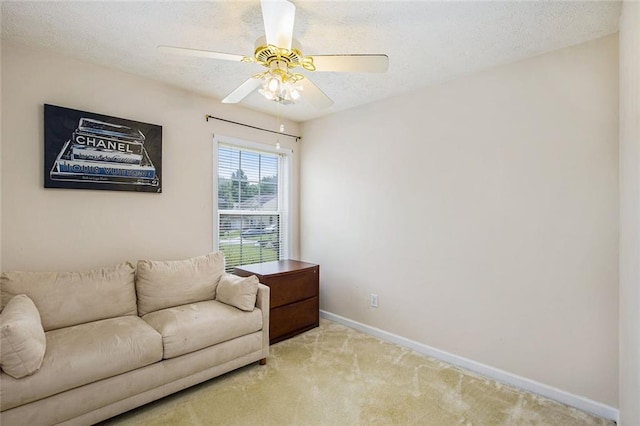 7057 Silver Bend Ovrlk, Austell, GA 30168 - sitting room with carpet floors, a textured ceiling, and ceiling fan