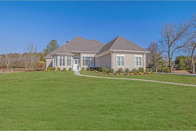 view of front of home with a front lawn