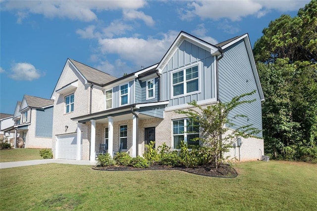 view of front of house with a front lawn and a garage