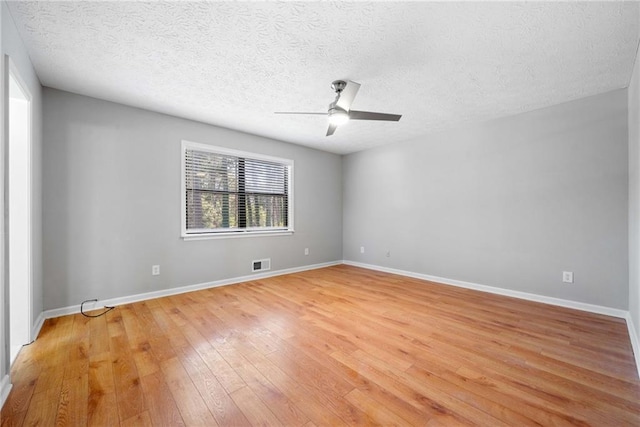 4347 Pleasant Ridge Rd, Decatur, GA 30034 - unfurnished room with a textured ceiling, ceiling fan, light wood-style flooring, baseboards, and visible vents