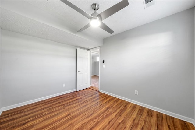 4347 Pleasant Ridge Rd, Decatur, GA 30034 - unfurnished bedroom featuring baseboards, wood finished floors, and a textured ceiling