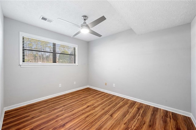 4347 Pleasant Ridge Rd, Decatur, GA 30034 - empty room featuring ceiling fan, baseboards, wood finished floors, and visible vents