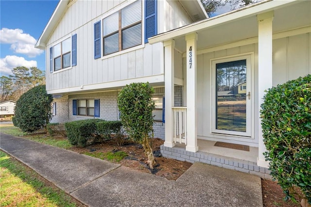 4347 Pleasant Ridge Rd, Decatur, GA 30034 - doorway to property featuring board and batten siding and brick siding