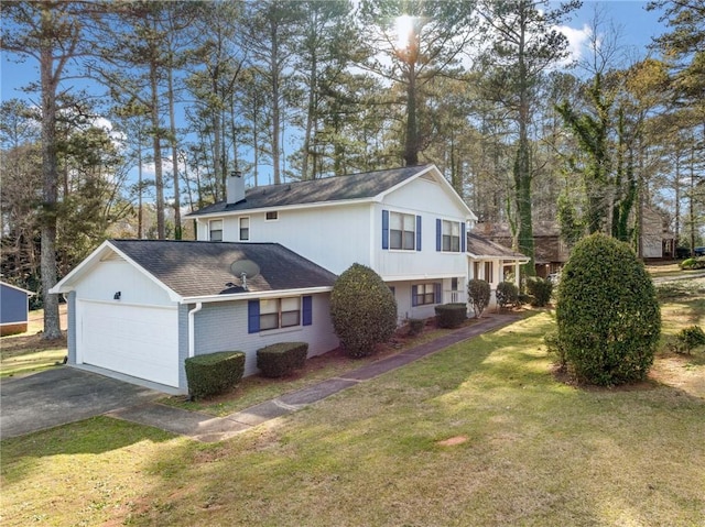 4347 Pleasant Ridge Rd, Decatur, GA 30034 - view of side of property with a chimney, a yard, an attached garage, driveway, and brick siding