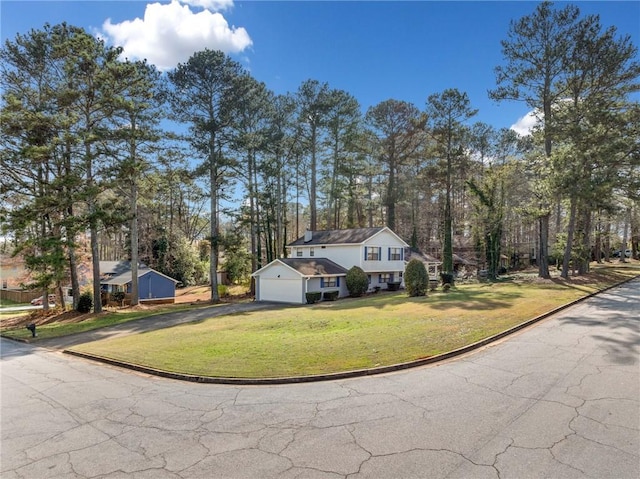 4347 Pleasant Ridge Rd, Decatur, GA 30034 - traditional-style home with a front lawn, aphalt driveway, and a garage