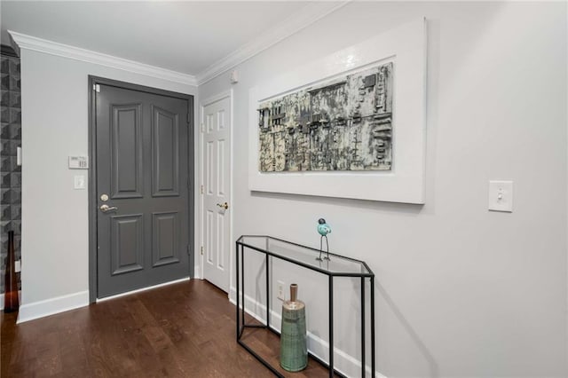 foyer entrance featuring dark hardwood / wood-style flooring and ornamental molding