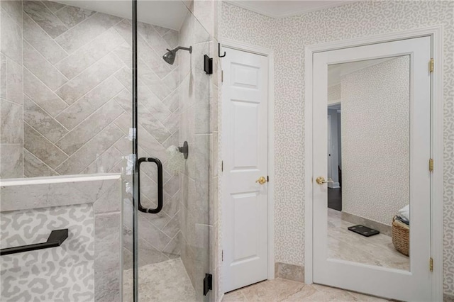 bathroom with tile patterned floors and a shower with shower door