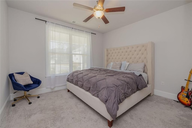 325 Caledonia Ct, Peachtree City, GA 30269 - carpeted bedroom with baseboards and ceiling fan