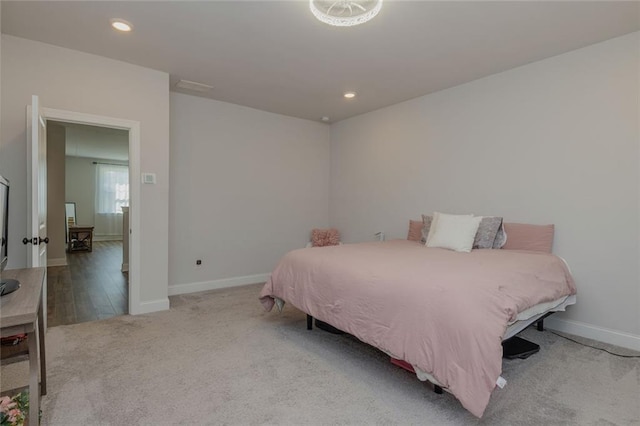 bedroom featuring baseboards, carpet flooring, and recessed lighting