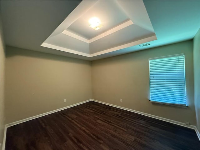 545 Platoro Ct SW, Atlanta, GA 30331 - unfurnished room featuring a raised ceiling and wood finished floors