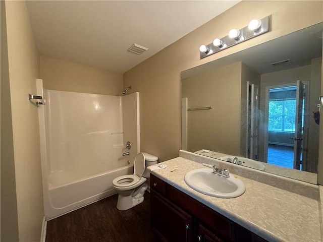 545 Platoro Ct SW, Atlanta, GA 30331 - full bathroom featuring wood finished floors, vanity, and shower / washtub combination