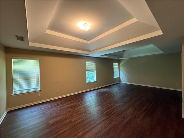 545 Platoro Ct SW, Atlanta, GA 30331 - spare room featuring a tray ceiling and dark wood finished floors