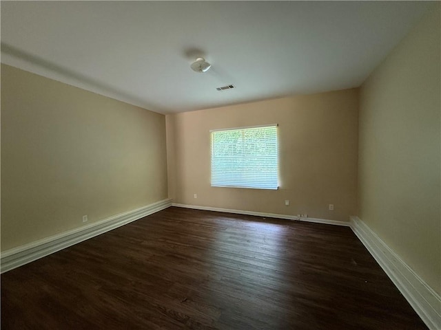 545 Platoro Ct SW, Atlanta, GA 30331 - unfurnished room featuring dark wood-type flooring and baseboards