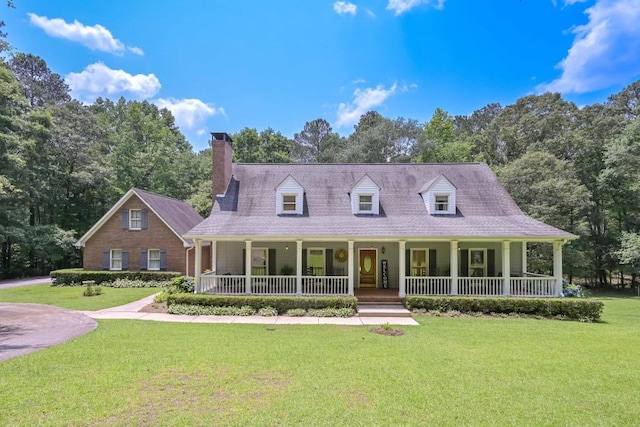 3743 Johnston Rd, Winston, GA 30187 - cape cod home featuring a porch, a chimney, and a front yard