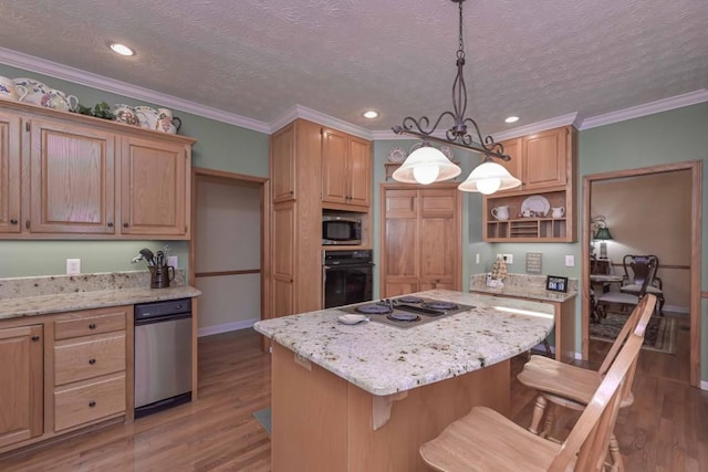3743 Johnston Rd, Winston, GA 30187 - kitchen with black oven, electric cooktop, stainless steel microwave, a center island, and a kitchen bar