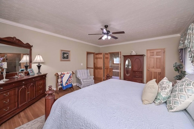 3743 Johnston Rd, Winston, GA 30187 - bedroom with wood finished floors, crown molding, a textured ceiling, and ceiling fan