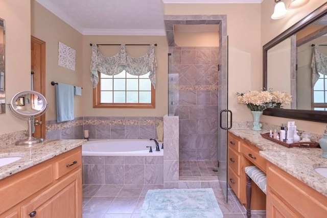 3743 Johnston Rd, Winston, GA 30187 - full bathroom with two vanities, crown molding, a shower stall, a garden tub, and plenty of natural light