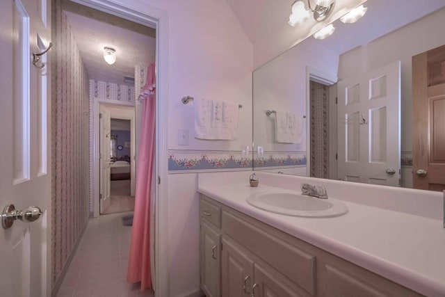 3743 Johnston Rd, Winston, GA 30187 - bathroom with wallpapered walls, vanity, and tile patterned flooring