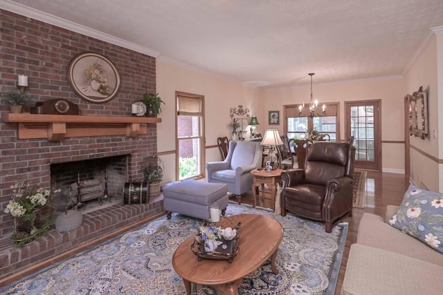 3743 Johnston Rd, Winston, GA 30187 - living room with a chandelier, wood finished floors, crown molding, and a fireplace