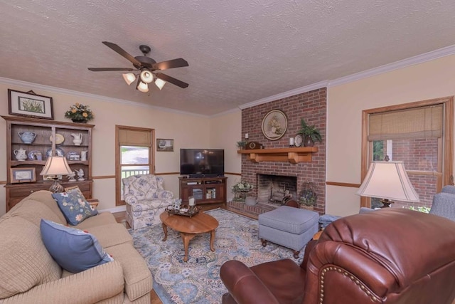 3743 Johnston Rd, Winston, GA 30187 - living room with a ceiling fan, a textured ceiling, ornamental molding, and a fireplace