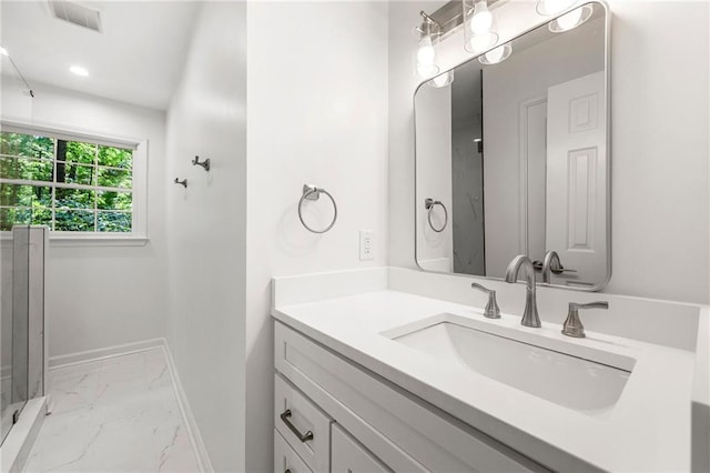 893 Vistavia Cir, Decatur, GA 30033 - full bath with marble finish flooring, baseboards, vanity, recessed lighting, and an enclosed shower