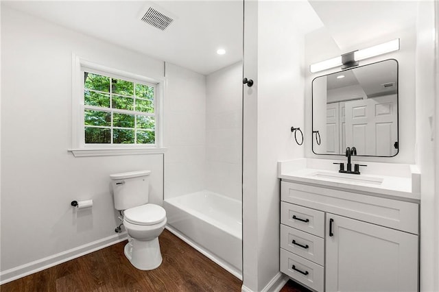 893 Vistavia Cir, Decatur, GA 30033 - full bath featuring toilet, baseboards, vanity, wood finished floors, and shower / tub combination
