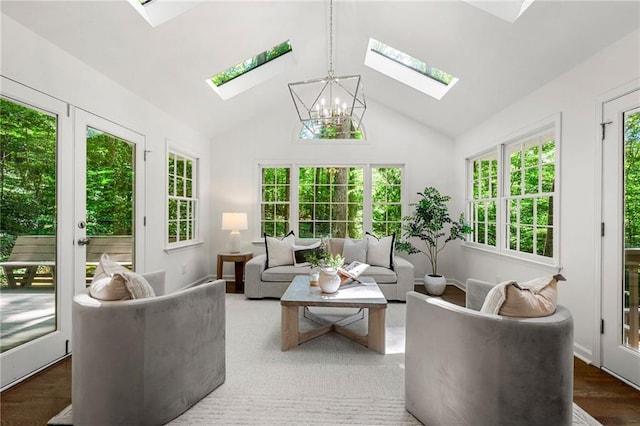 893 Vistavia Cir, Decatur, GA 30033 - sunroom featuring a skylight, french doors, a chandelier, and vaulted ceiling