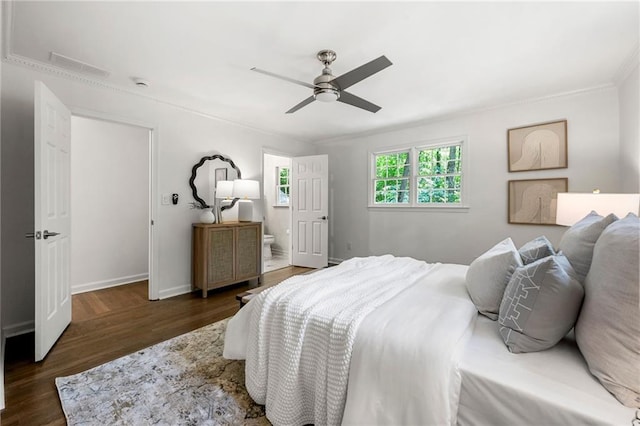 893 Vistavia Cir, Decatur, GA 30033 - bedroom with wood finished floors, baseboards, connected bathroom, ceiling fan, and ornamental molding