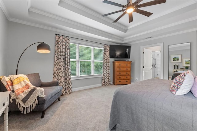 bedroom featuring visible vents, crown molding, baseboards, light carpet, and a raised ceiling