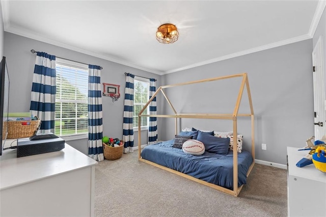 carpeted bedroom featuring baseboards and ornamental molding