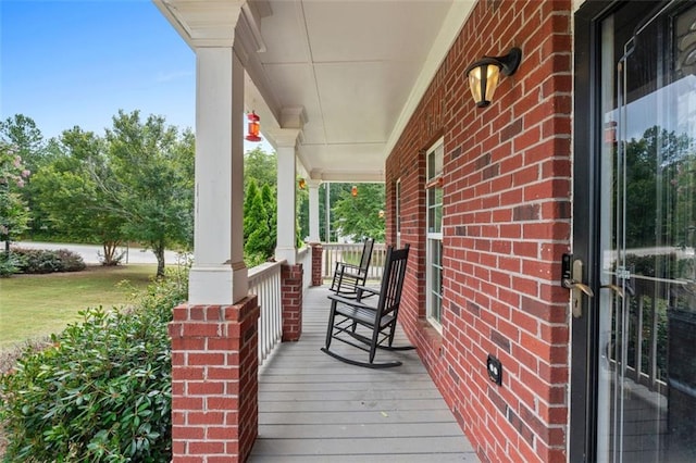 wooden deck featuring a porch