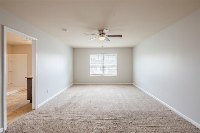 1003 Eldon Ln, Fairburn, GA 30213 - empty room featuring light carpet, baseboards, and a ceiling fan