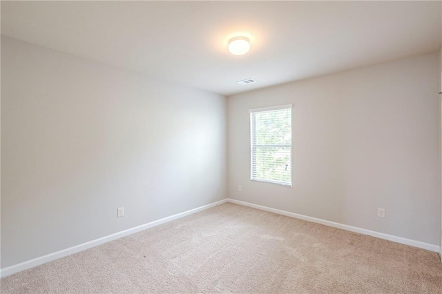 1003 Eldon Ln, Fairburn, GA 30213 - empty room featuring baseboards, visible vents, and light colored carpet