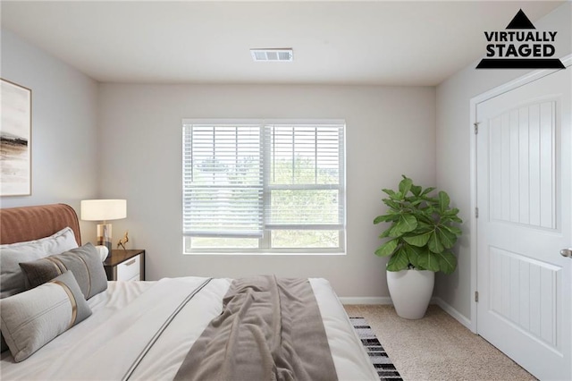 1003 Eldon Ln, Fairburn, GA 30213 - bedroom featuring carpet flooring, baseboards, and visible vents