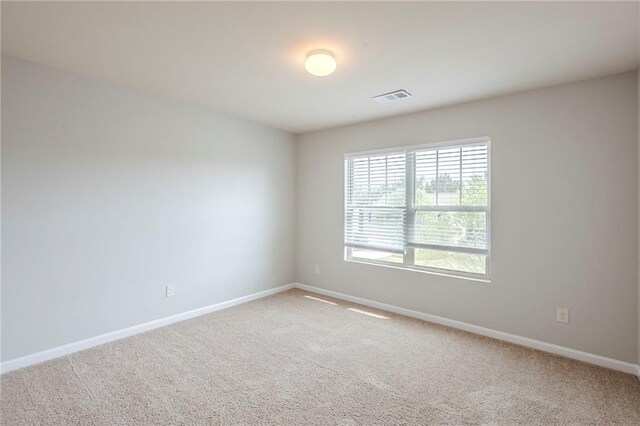 1003 Eldon Ln, Fairburn, GA 30213 - carpeted spare room with visible vents and baseboards