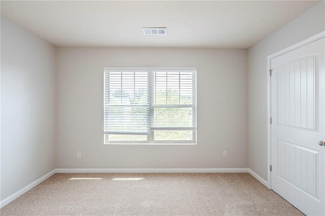 1003 Eldon Ln, Fairburn, GA 30213 - unfurnished room featuring light carpet, baseboards, and visible vents
