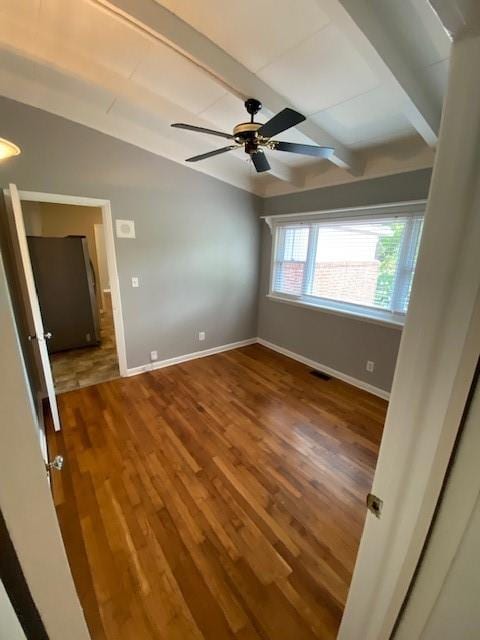 1177 Baker Ln, Marietta, GA 30062 - empty room with baseboards, wood finished floors, beam ceiling, and ceiling fan