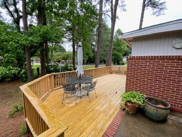 1177 Baker Ln, Marietta, GA 30062 - wooden deck with outdoor dining space